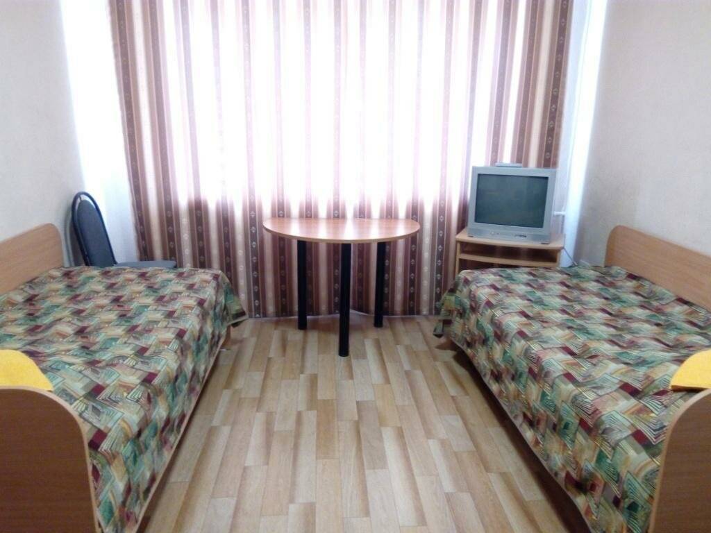 Номер эконом с 2 односпальными кроватями (удобства на этаже)